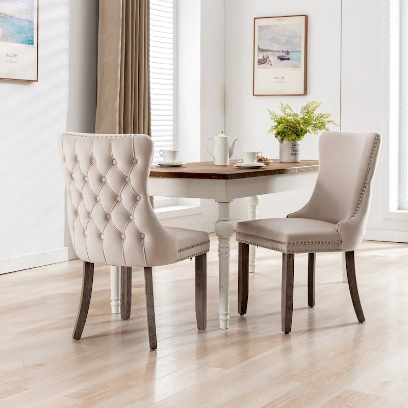 Chaise de salle à manger tapissée à dossier en ailes