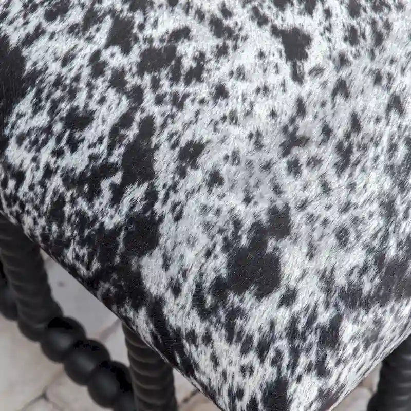 Petit banc en similicuir imitation peau de vache