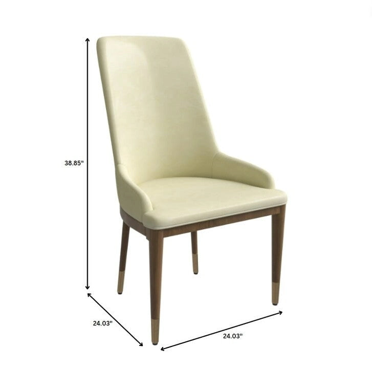 Chaise de salle à manger en cuir rembourré avec piètement doré - Dossier haut