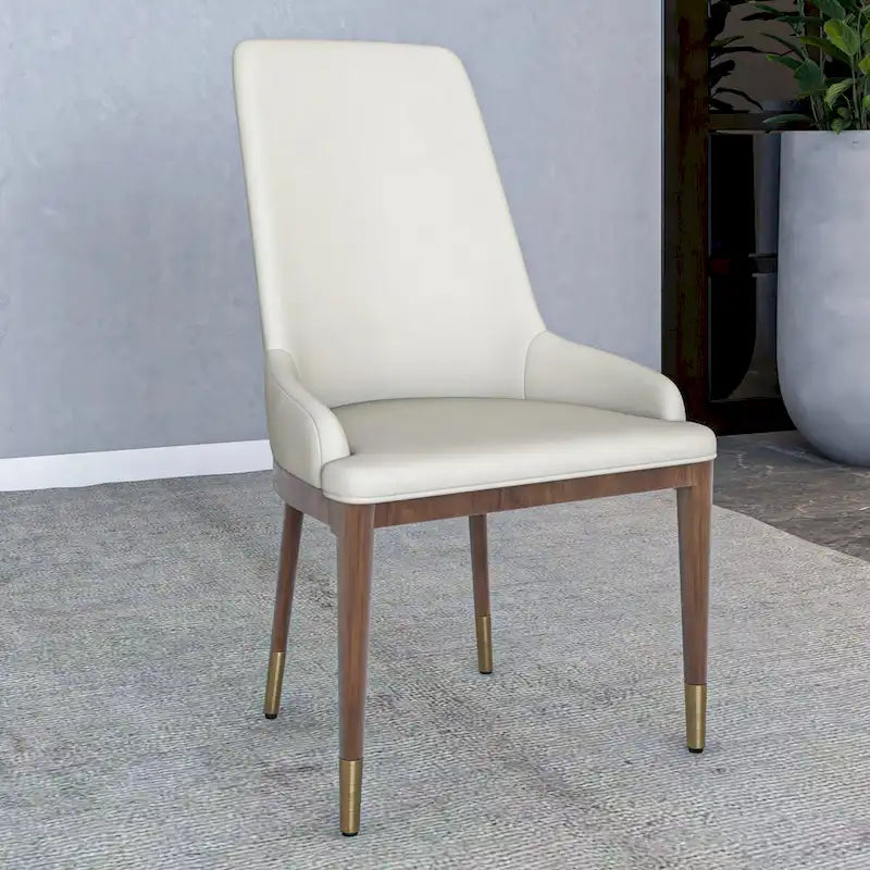 Chaise de salle à manger en cuir rembourré avec piètement doré - Dossier haut